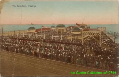 "The Bandstand, Hastings" note huge crowds and tramlines c 1918? 
